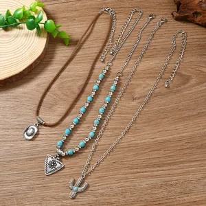 Bohemian Western jewelry set featuring cactus, cowboy hat charms and turquoise beads