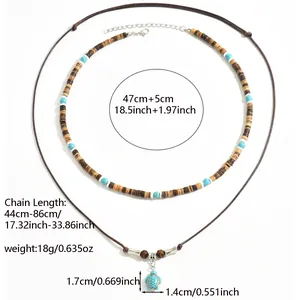 Detail view of ethnic bead necklace and turtle pendant with precise measurements