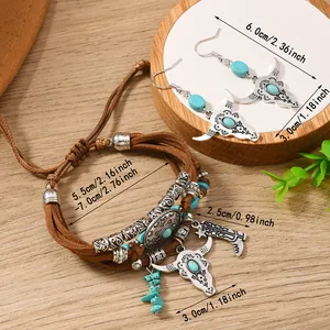 Bohemian jewelry set with turquoise bull head pendant bracelet and earrings on wood