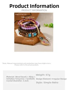 Detailed view of bohemian stacked bracelet with wooden beads and turquoise crystal pendant