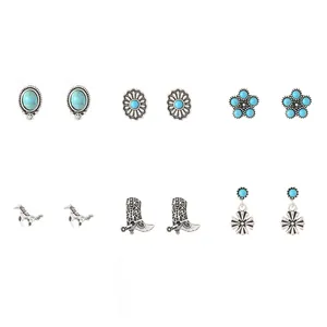 Dettaglio di set di 6 paia di orecchini boho con turchese e motivi a stivale da cowboy