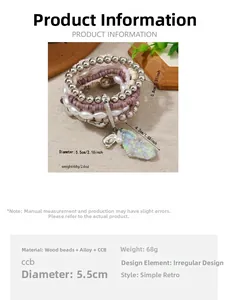 Detail of bohemian multilayer beaded bracelet with irregular raw stone pendant and charm