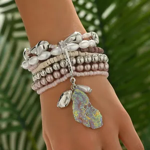 Bohemian multilayered beaded bracelet set with iridescent stone pendant and faux pearls