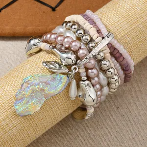 Bohemian multilayer beaded bracelet set with pink pearls and iridescent stone charm