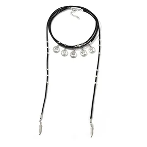 Detailed view of bohemian layered choker with silver coins and feather pendants
