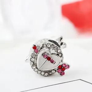 Cupid's heart bead charm with pink crystals and silver hollow design for bracelets