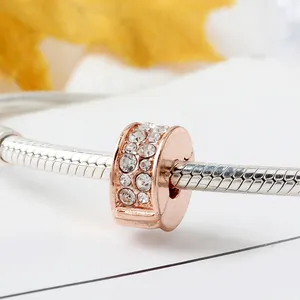 Rose gold plated charm with double-row cubic zirconia on a silver snake chain