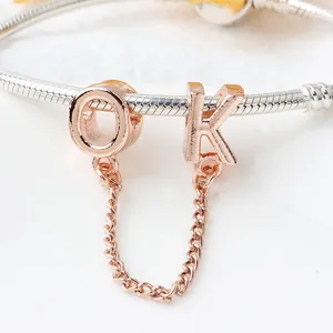 Bracciale a catena serpente argento con ciondoli OK oro rosa e catenina di sicurezza