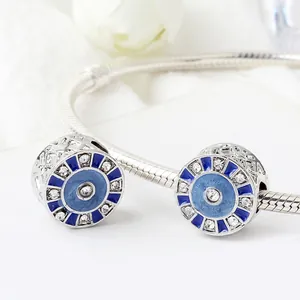 Evil eye charm bead in blue enamel with white rhinestones on silver snake chain