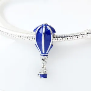 Dark blue enamel hot air balloon charm on silver-colored snake chain bracelet