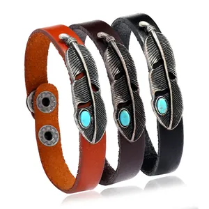 Set of three vintage leather feather bracelets with turquoise stones and metal snaps