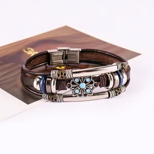 Bracciale multistrato in pelle retrò con fiore in metallo blu e chiusura in acciaio inox