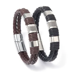 Detail view of woven leather bracelets with knurled metal sliders and magnetic clasps
