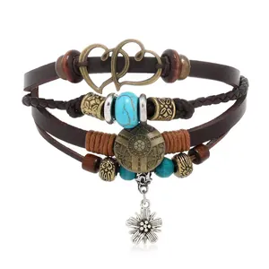 Mehrlagiges Lederarmband im Retro-Stil mit Türkisperlen und Blumenanhängern