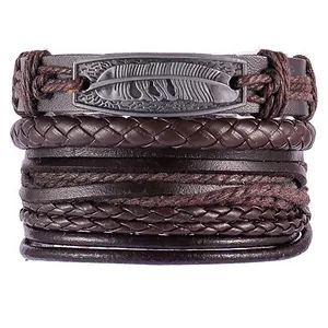 Detailed view of multilayer leather bracelet with feather engraved metal plate ornament