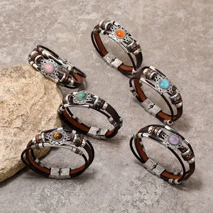 Detail of vintage leather bracelets with natural stone beads and stainless steel clasp