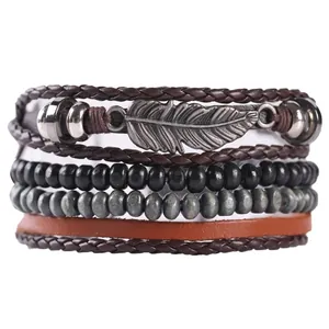 Vintage multilayer leather bracelet with silver feather charm and turquoise beads