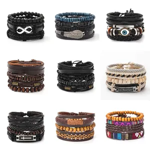Vintage mehrlagiges Lederarmband-Set mit Flügelanhängern und Unendlichkeitssymbolen auf weiß