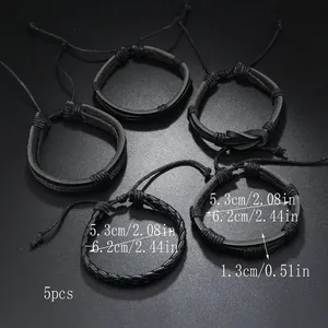 Macro detail of 5-piece black braided leather bracelet set with size specifications
