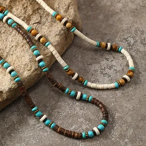 Vintage bohemian necklace with turquoise beads and coconut shell spacers on natural rock