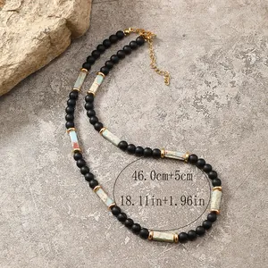 Collana vintage da uomo con pietre nere e cilindri di diaspro grigio