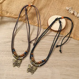 Retro butterfly alloy pendant necklace with multi-layer wooden beads and woven rope