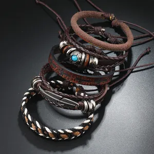 Vintage-Set aus 6 geflochtenen Lederarmbändern mit Türkisperlen und Federanhänger