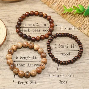 Juego de tres pulseras de cuentas de madera natural con madera de agar y peral negro