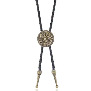 Cravate bolo vintage avec médaillon tournesol en bronze antique et cordon tressé noir