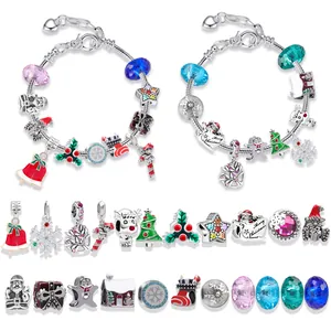 Detailed view of DIY Christmas charm bracelet kit with festive beads and pendants