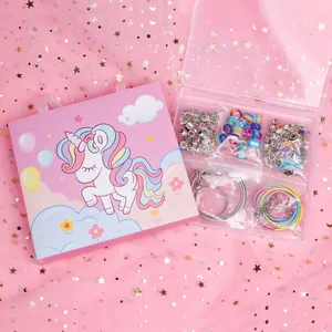 DIY jewelry kit detail featuring pink unicorn gift box and colorful beads for children