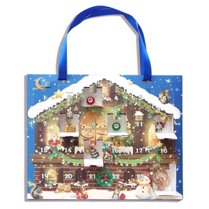 Kerst adventskalender met DIY gouden kralen en armband in blauwe geschenkdoos