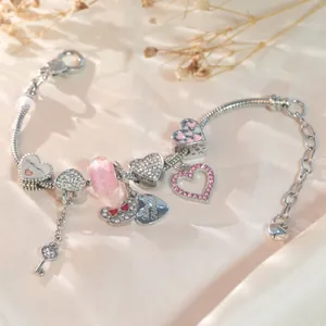 Rosa Perlenarmband mit Herzanhängern graviert mit Goddaughter und Best Friends