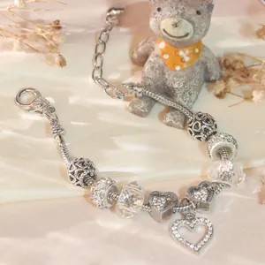 Silver lobster clasp snake chain bracelet with heart pendants and sparkling crystal beads