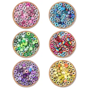 Macro shot of assorted faceted resin and glass large hole beads for DIY jewelry making