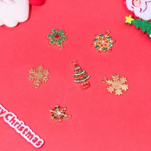 6pcs Christmas alloy pendant set featuring snowflake and tree charms on red background