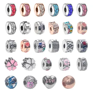 Collection of 28 assorted alloy spacer beads with zircon and enamel for DIY bracelets