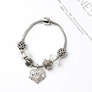 Bracelet maille serpent argenté avec pendentif cœur niece, couronne et perles bleues