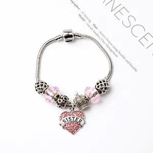 Bracelet argenté avec perles en cristal rose et pendentif cœur gravé SISTER élégant