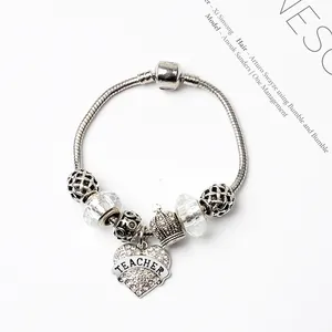 Bracelet maille serpent argenté avec breloque cœur Teacher et pendentif couronne