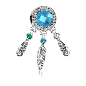 Silver dreamcatcher pendant with blue crystal and three feather charms for jewelry making
