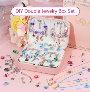 Close-up of a pink double jewelry box and princess gift bag for girls' DIY bracelet kits