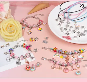 Detail of DIY jewelry making kit with pink unicorn charms and colorful beads for girls