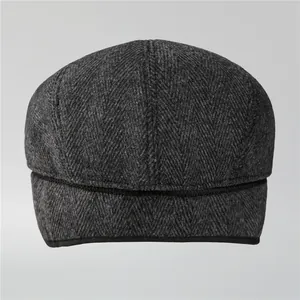 Men's winter grey herringbone flat cap with warm fleece lining and ear protection