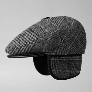 Classic plaid winter flat cap for men with warm ear flaps and thick woolen texture