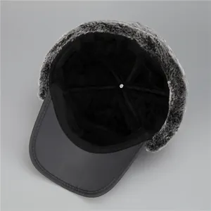 Winter thermal trapper hat for men with faux fur lining and ear flaps in dark grey