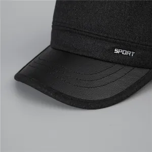 Men's wool winter flat cap with ear protection and black leather brim for outdoor warmth