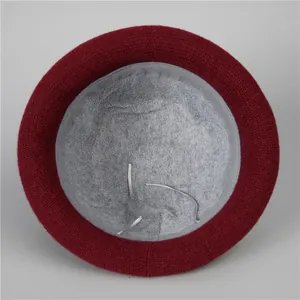 Close-up of the thick grey fleece lining and adjustable drawstring inside the knit hat