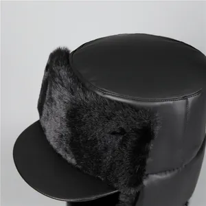 Detailed view of the shiny faux leather texture and thick thermal fur lining on the hat