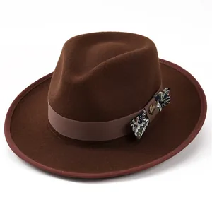 Detail of wool fedora hat with paisley bow accent and vintage metal buckle detail